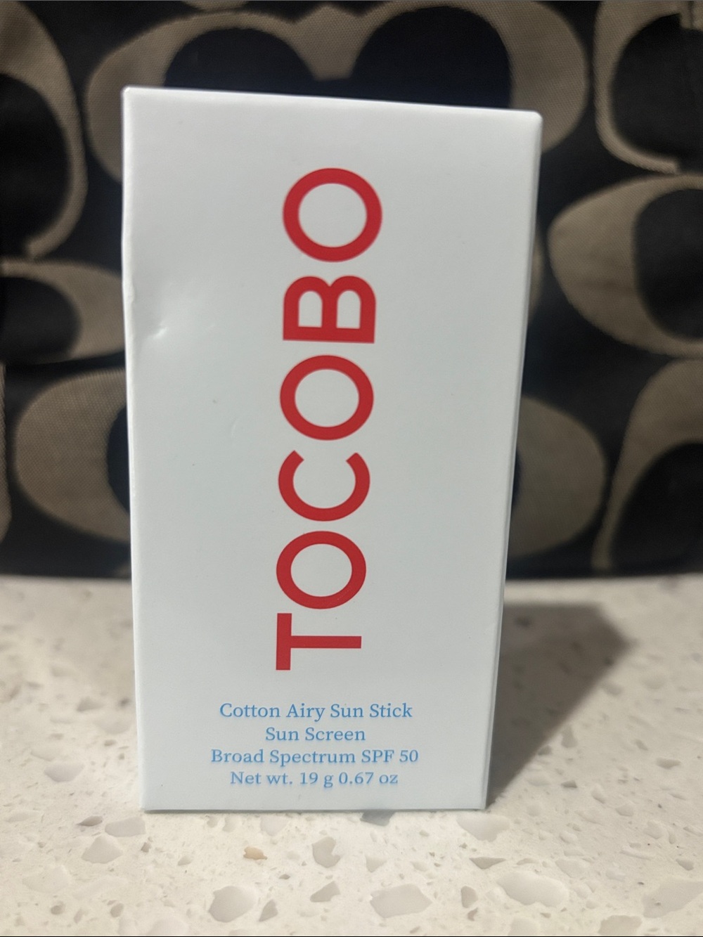 TOCOBO Cotton Airy Sun Stick SPF 50 - White with Red Logo